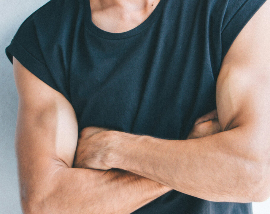 chest view of man crossing his arms
